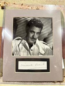 Autographed matted photograph of Gilbert Roland